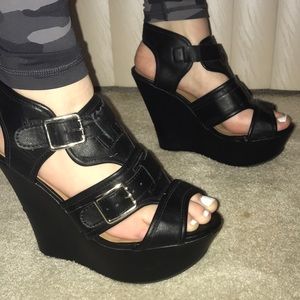 Black buckle wedges